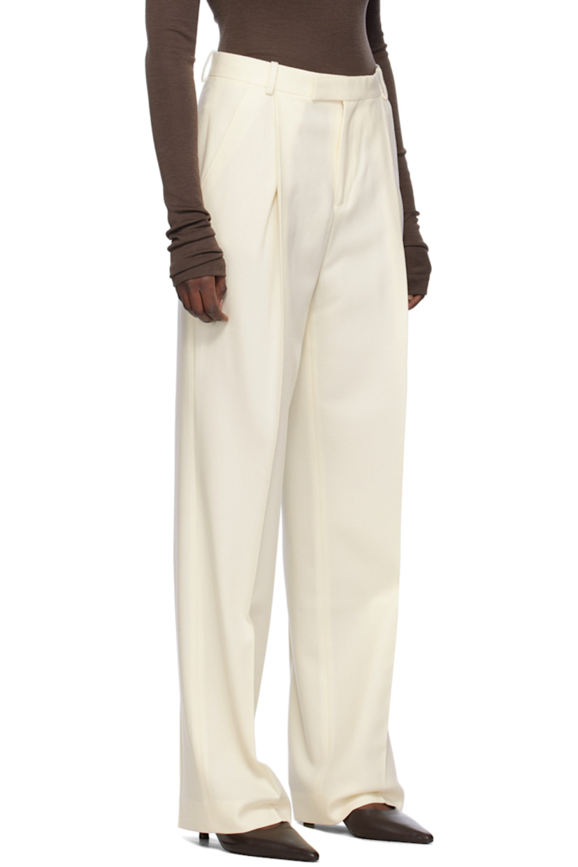 Straight-leg wool flannel trousers.

· Belt loops 
· Four-pocket styling 
· Zip-fly 
· Pleats at front
· Creased legs

Supplier color: Off white