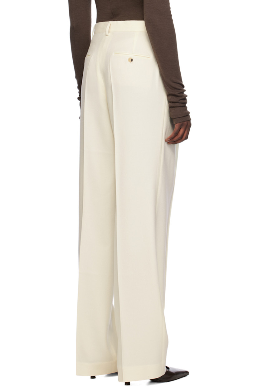 Straight-leg wool flannel trousers.

· Belt loops 
· Four-pocket styling 
· Zip-fly 
· Pleats at front
· Creased legs

Supplier color: Off white