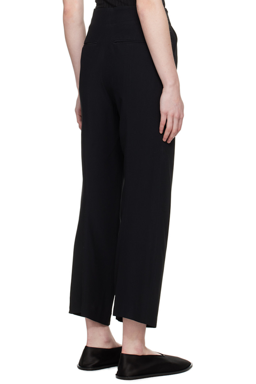 Lightweight loose-fit straight-leg viscose- and acetate-blend crepe trousers. 

· Low-rise 
· Four-pocket styling
· Zip-fly 
· Creased legs
· Cropped cuffs
· Unlined

Supplier color: Black