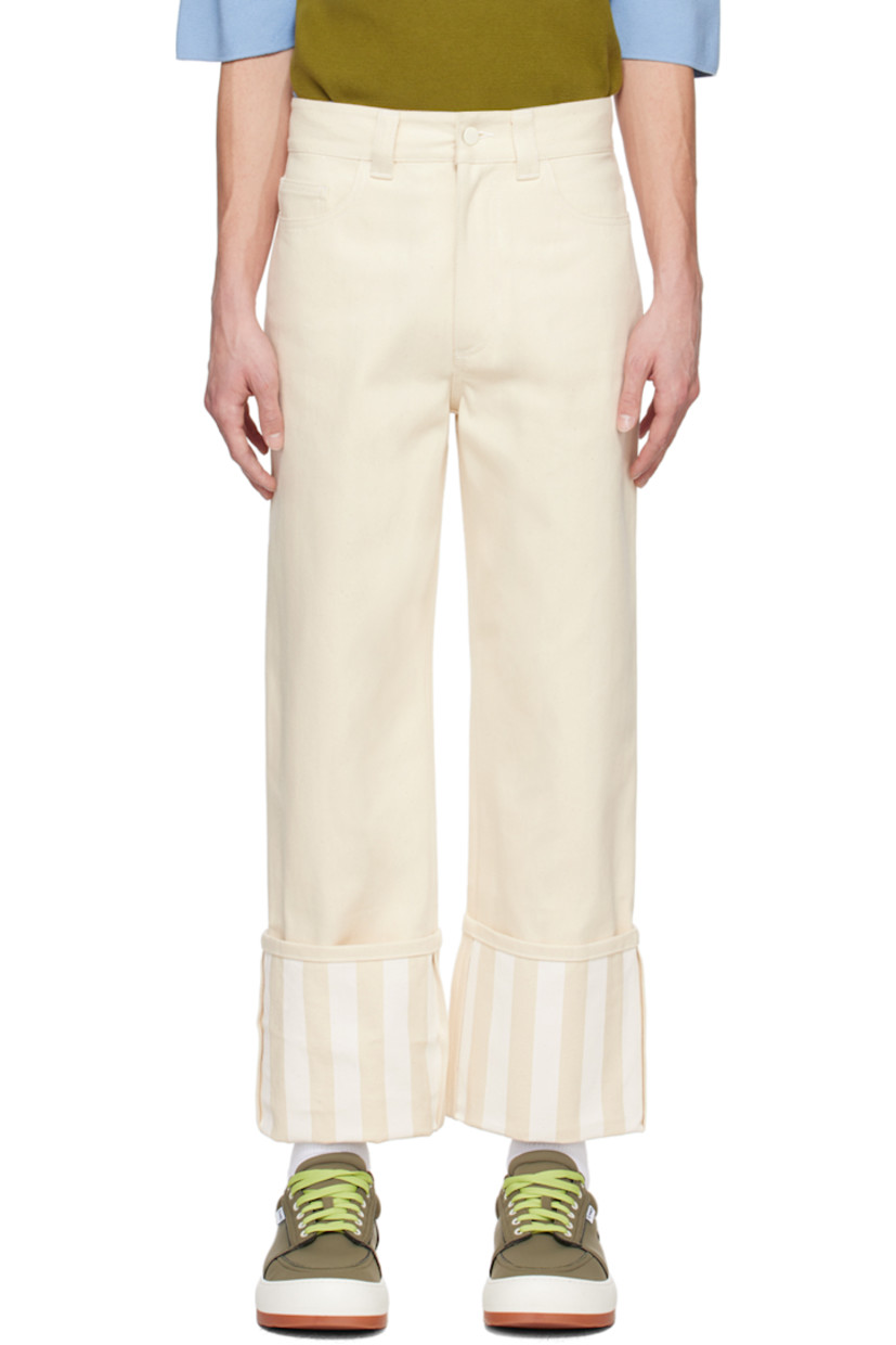 Non-stretch denim jeans.

· Belt loops
· Five-pocket styling
· Zip-fly
· Stripes at rolled cuffs
· Logo patch at back waistband

Supplier color: Ecru/White stripes