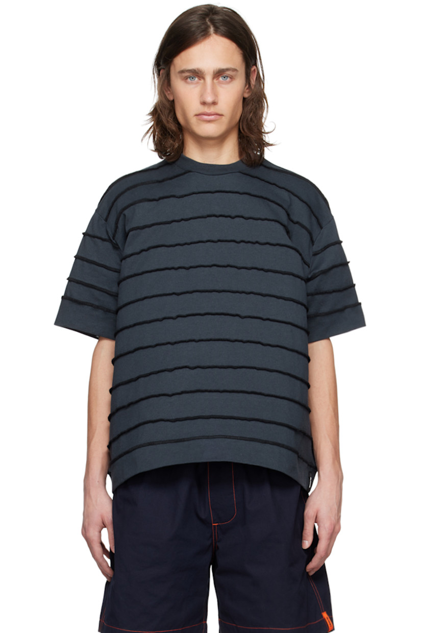 Heavyweight organic cotton jersey T-shirt. Exposed seams throughout.

· Paneled construction
· Rib knit crewneck
· Logo flag at side seam
· Dropped shoulders

Supplier color: Dark blue
