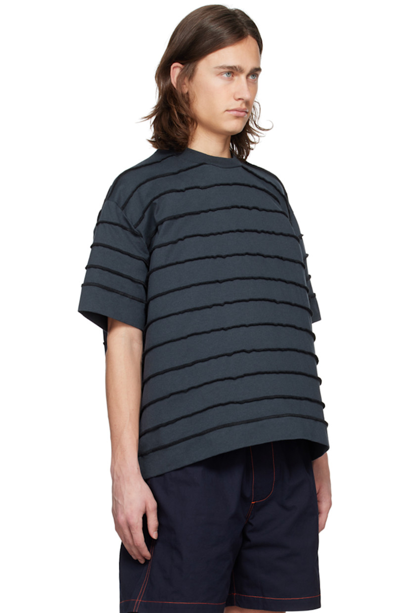 Heavyweight organic cotton jersey T-shirt. Exposed seams throughout.

· Paneled construction
· Rib knit crewneck
· Logo flag at side seam
· Dropped shoulders

Supplier color: Dark blue