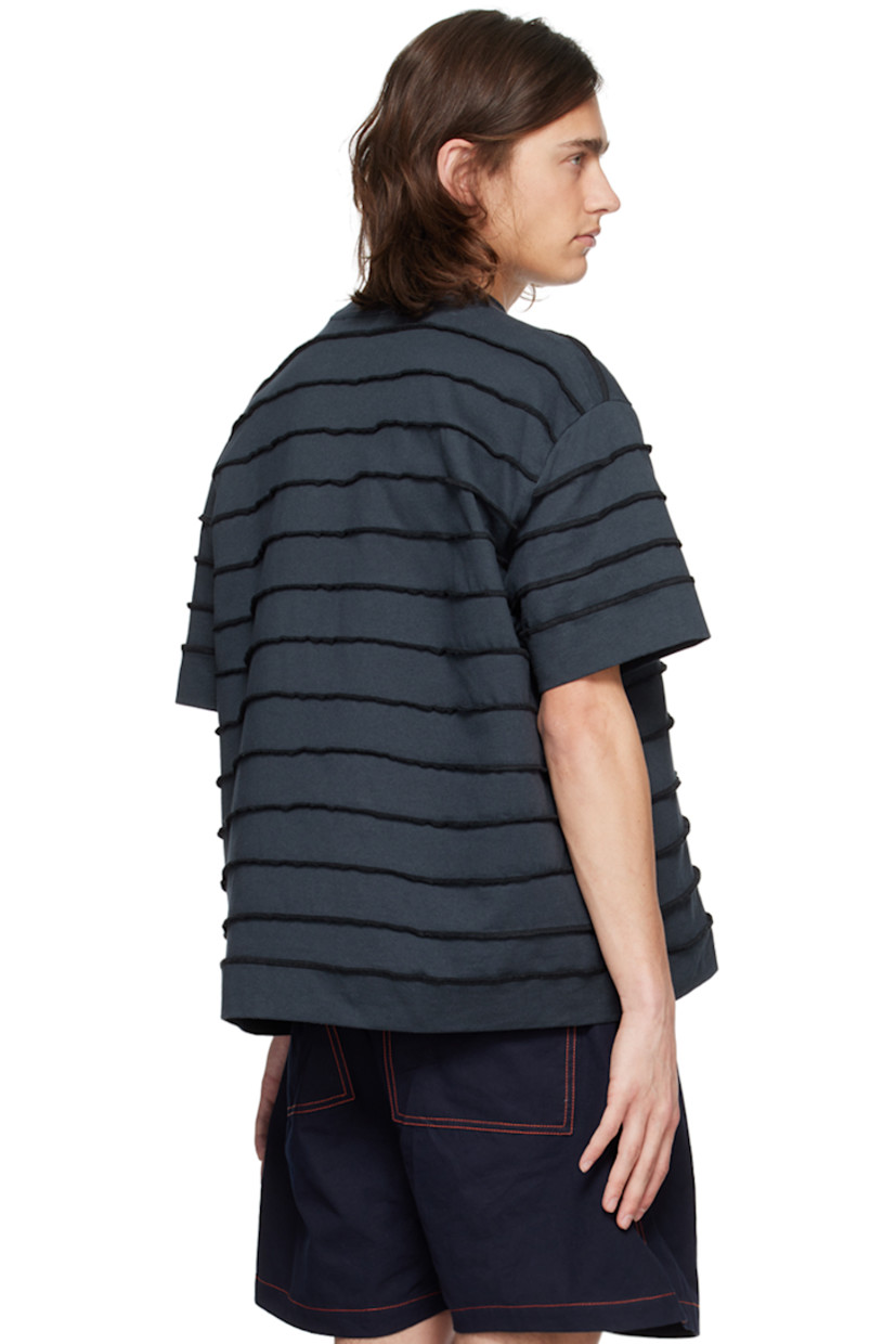 Heavyweight organic cotton jersey T-shirt. Exposed seams throughout.

· Paneled construction
· Rib knit crewneck
· Logo flag at side seam
· Dropped shoulders

Supplier color: Dark blue