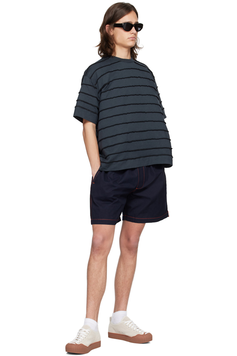 Heavyweight organic cotton jersey T-shirt. Exposed seams throughout.

· Paneled construction
· Rib knit crewneck
· Logo flag at side seam
· Dropped shoulders

Supplier color: Dark blue