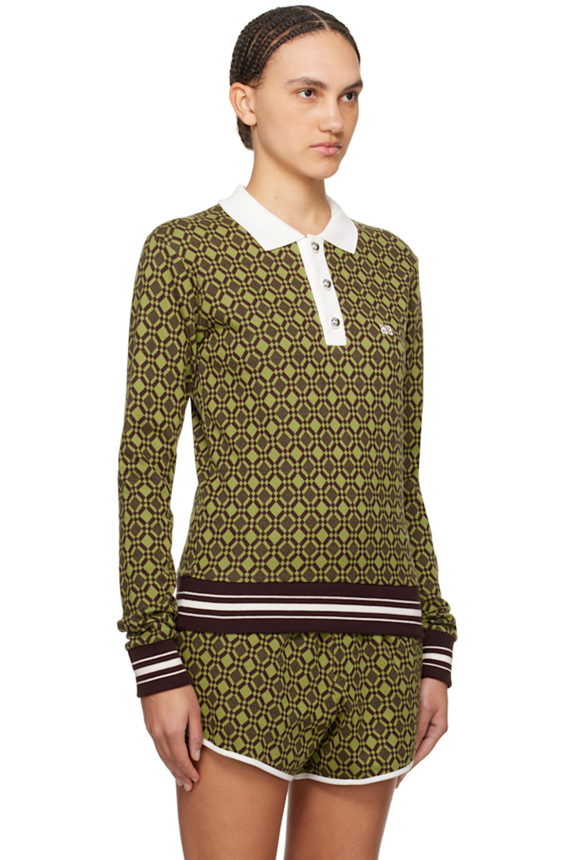 Knit stretch organic cotton polo. Jacquard graphic pattern throughout. 

· Rib knit spread collar
· Three-button placket
· Logo embroidered at chest
· Striped rib knit hem and cuffs

Supplier color: Olive/Dark brown