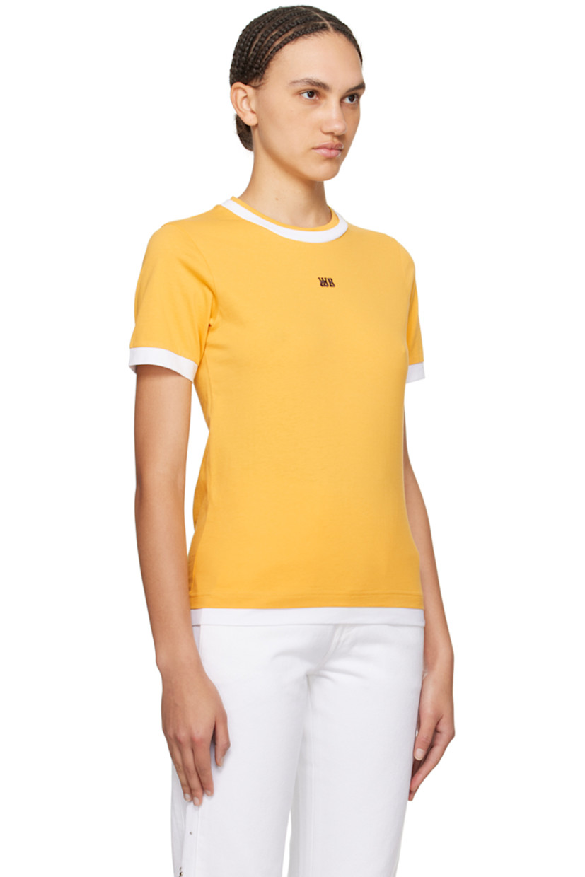 Organic cotton jersey T-shirt. 

· Layered construction
· Crewneck
· Logo embroidered at chest
· Embroidered graphic patch at sleeve
· Logo printed at back collar

Supplier color: Turmeric