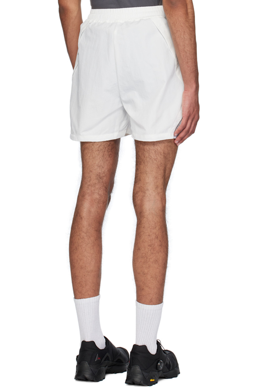 Nylon taffeta shorts.

· Concealed drawstring at elasticized waistband
· Two-pocket styling
· Mesh trim at outseams

Supplier color: Bright white
