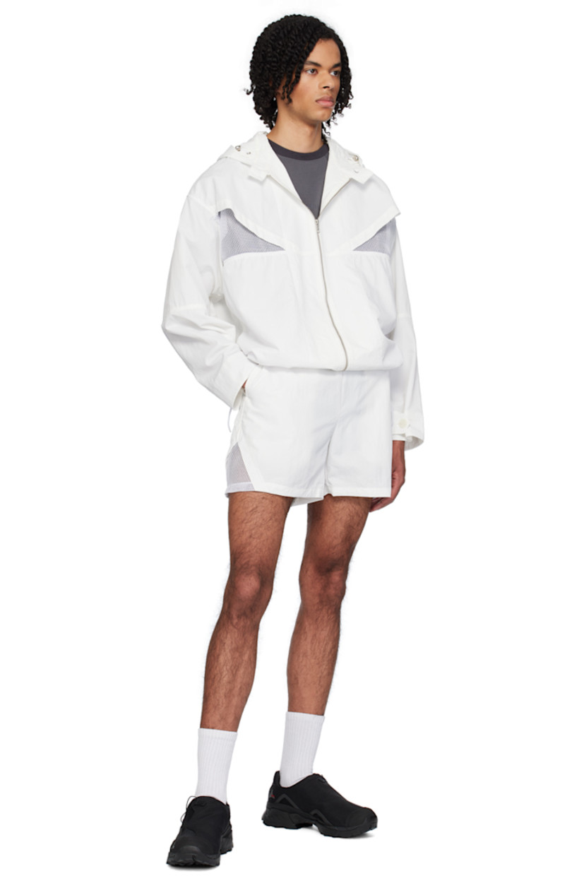 Nylon taffeta shorts.

· Concealed drawstring at elasticized waistband
· Two-pocket styling
· Mesh trim at outseams

Supplier color: Bright white