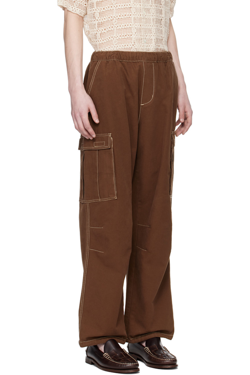 Relaxed-fit cotton twill cargo pants. 

· Concealed drawstring at elasticized waistband
· Three-pocket styling 
· Drawstring at hem 
· Flap pocket at outseams 
· Contrast topstitching in off-white 

Supplier color: Washed brown