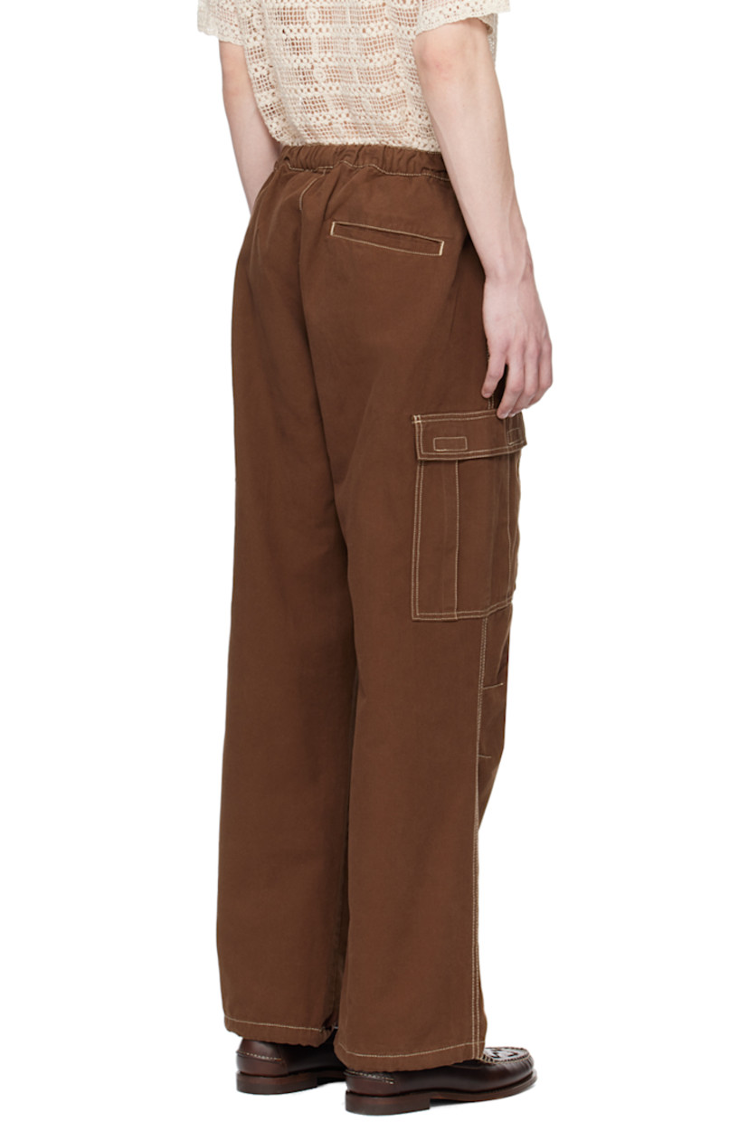 Relaxed-fit cotton twill cargo pants. 

· Concealed drawstring at elasticized waistband
· Three-pocket styling 
· Drawstring at hem 
· Flap pocket at outseams 
· Contrast topstitching in off-white 

Supplier color: Washed brown