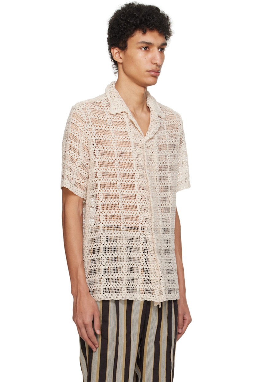 Semi-sheer cotton lace shirt. 

· Open spread collar
· Button closure
· Unlined

Supplier color: Ecru