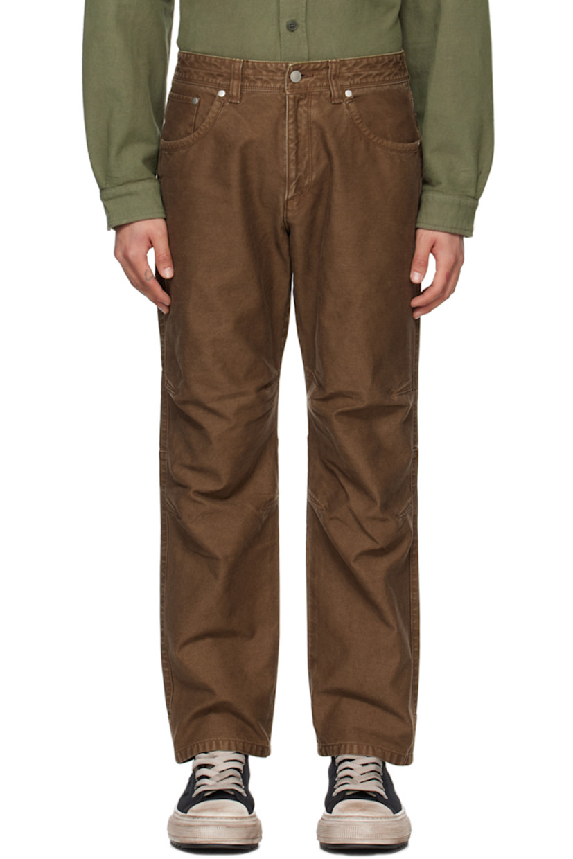 Cotton twill trousers.

· Belt loops
· Five-pocket styling
· Zip-fly 
· Dart at knees
· Welt pocket at back 

Supplier color: Brown