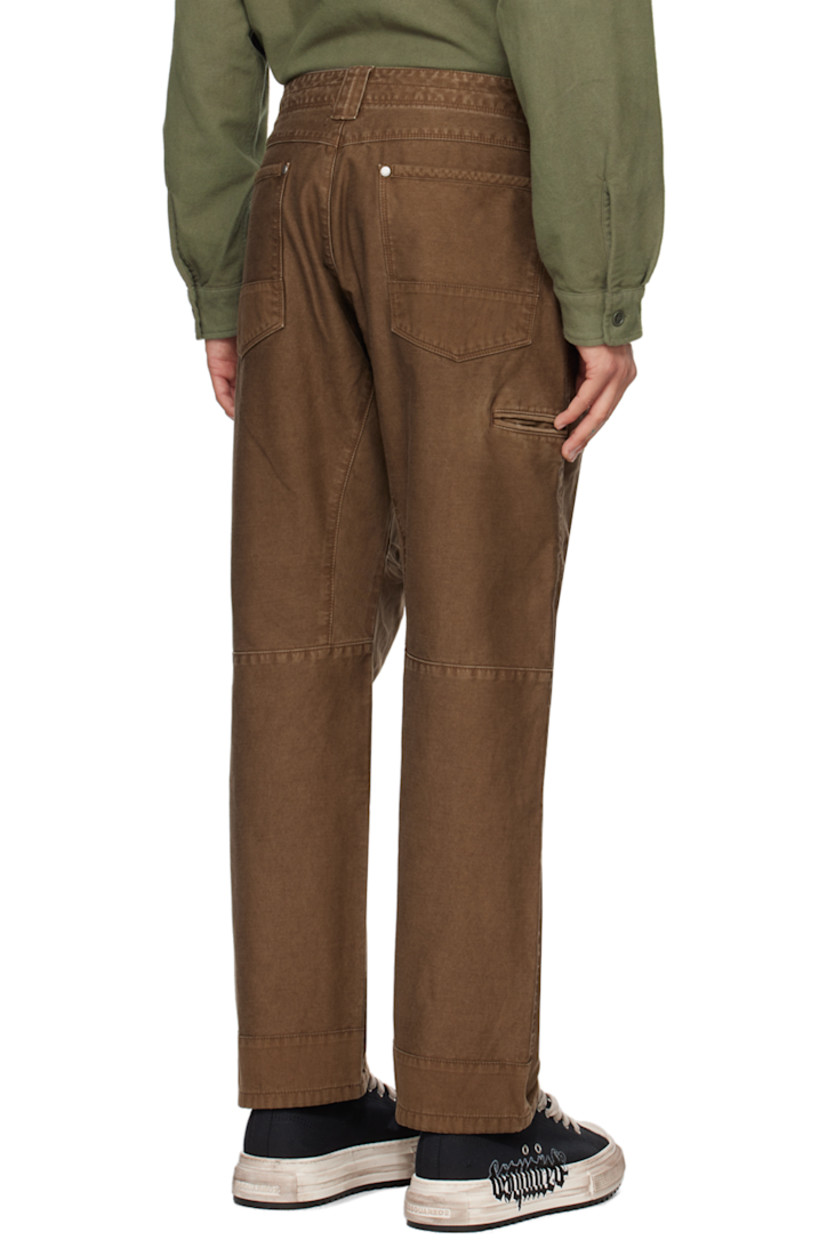 Cotton twill trousers.

· Belt loops
· Five-pocket styling
· Zip-fly 
· Dart at knees
· Welt pocket at back 

Supplier color: Brown