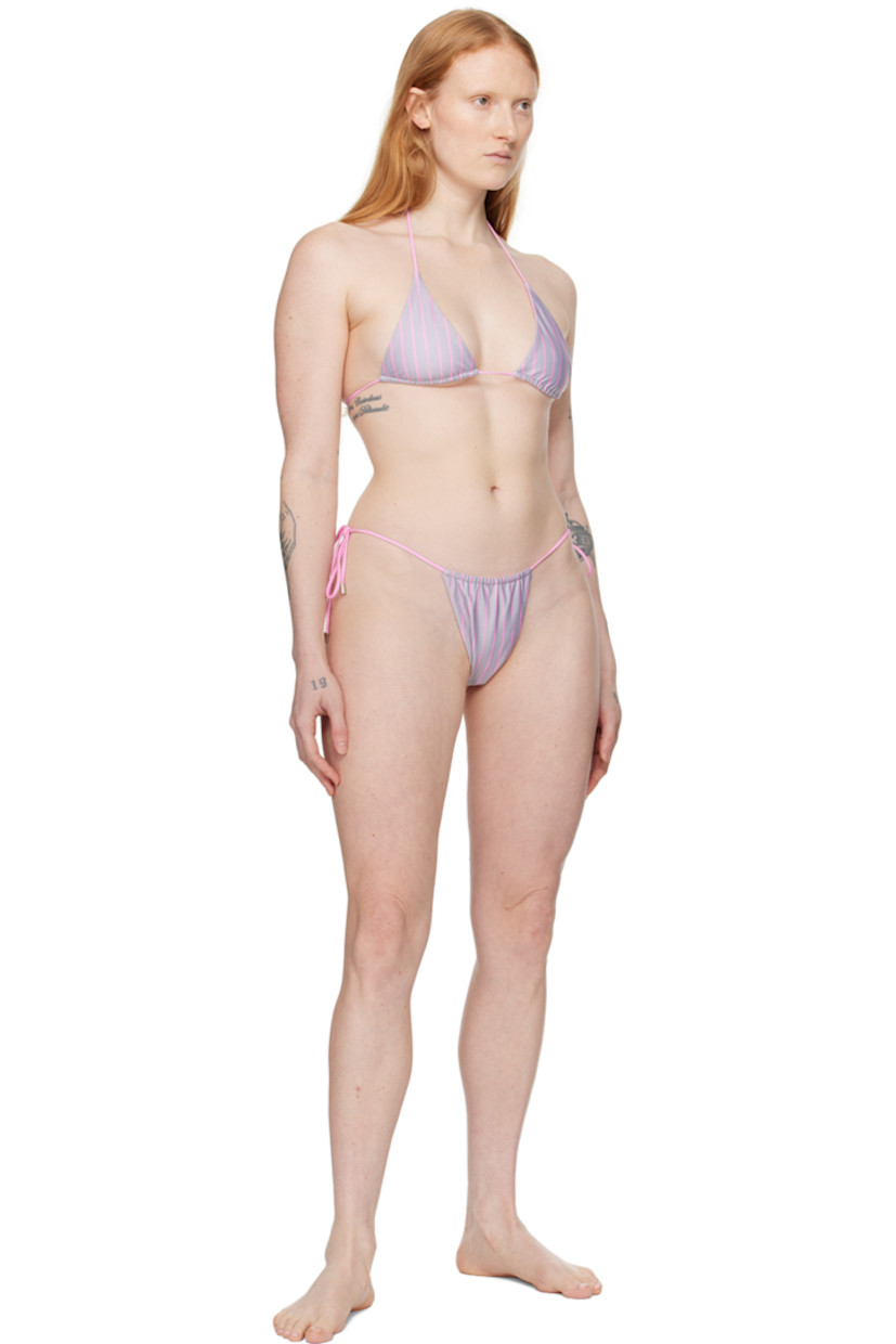 Reversible stretch recycled polyester jersey bikini top. Stripes and logos printed throughout.

Reverse in pink stretch recycled polyester jersey.

· Self-tie halter strap 
· Self-tie fastening at back
· Fully lined

Supplier color: Grey/Pink pinstripe