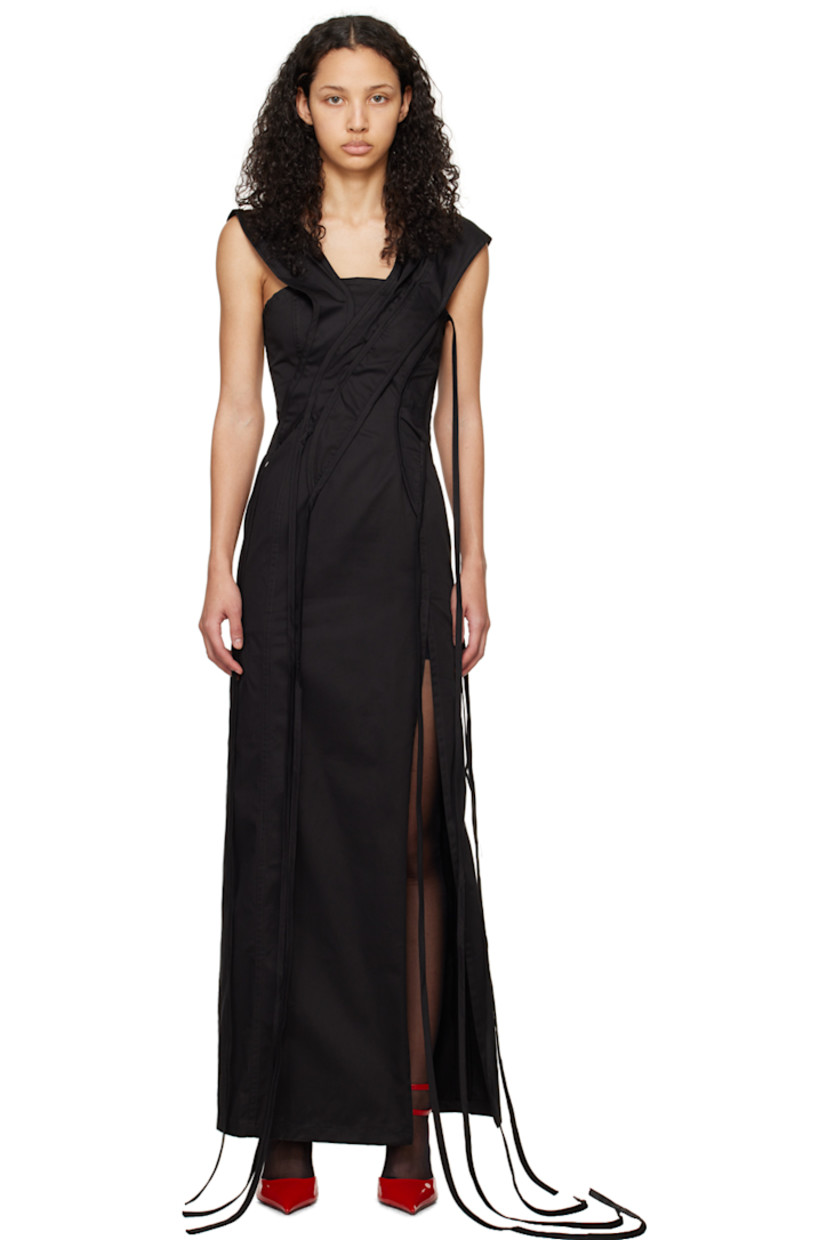 Paneled cotton twill dress. Self-tie strap detailing throughout for alternate styling.

· Layered construction
· V-neck
· Braided strap at front
· Central vent at front hem
· Concealed zip closure at outseam

Supplier color: Black