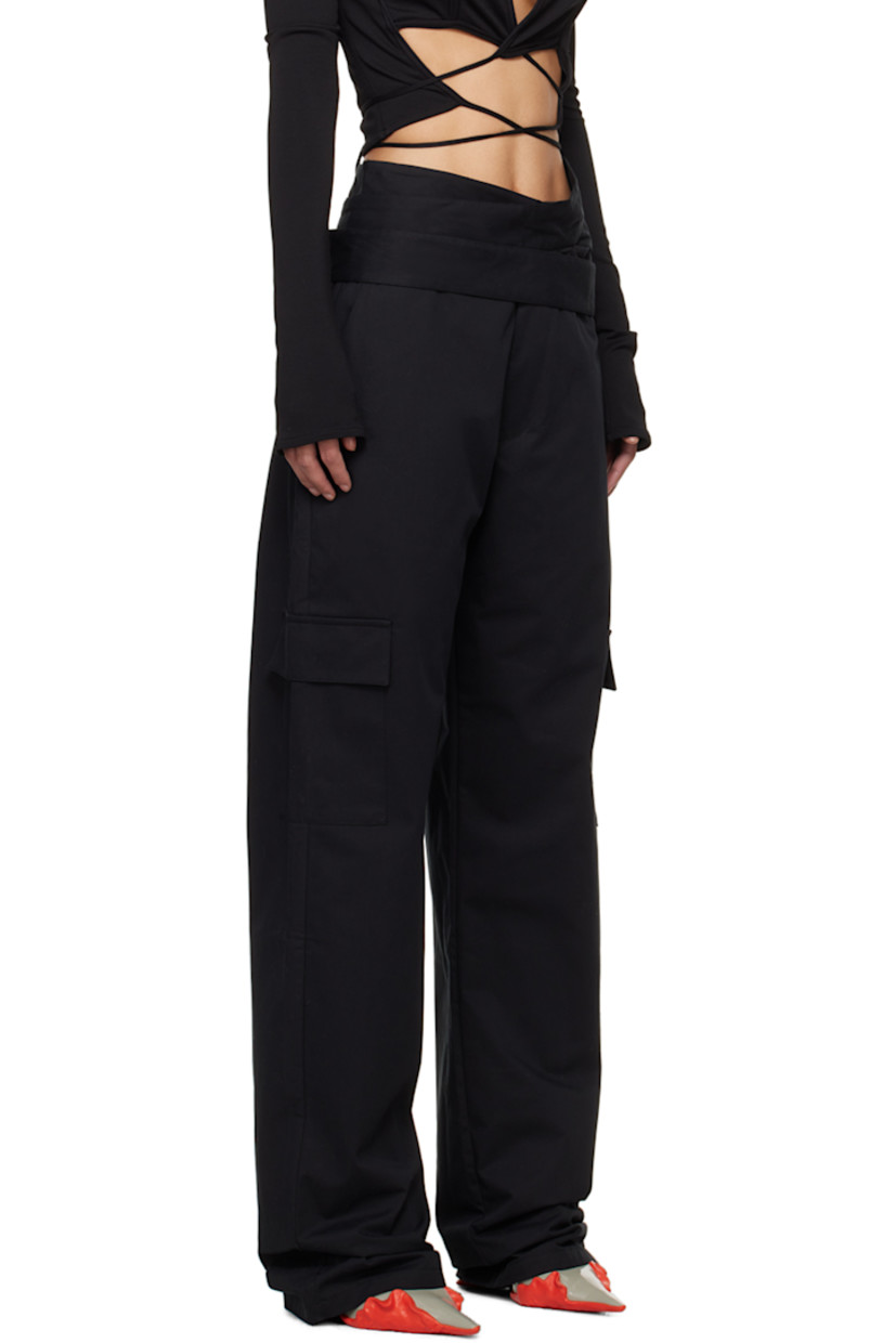 Cotton twill cargo pants.

· Wrap construction
· Integrated self-tie belt 
· Four-pocket styling 
· Zip-fly
· Cargo pocket at outseams

Supplier color: Black