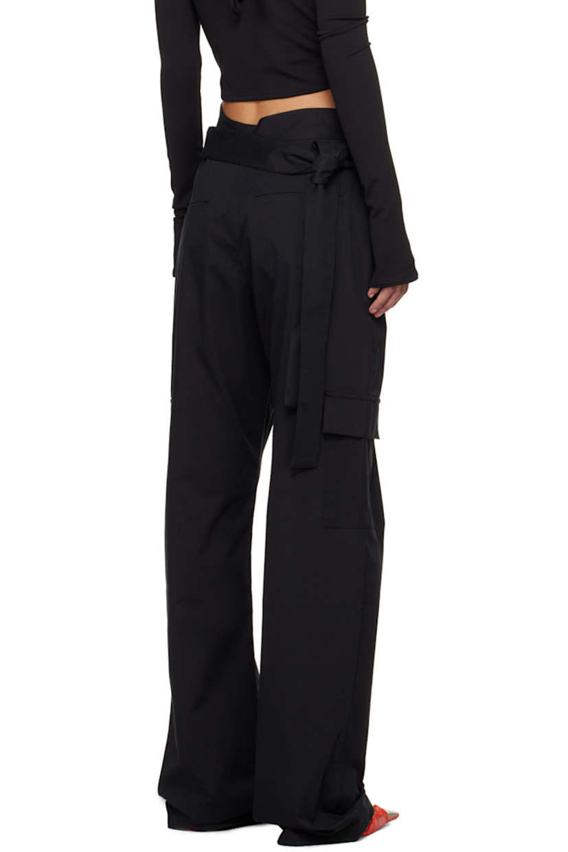 Cotton twill cargo pants.

· Wrap construction
· Integrated self-tie belt 
· Four-pocket styling 
· Zip-fly
· Cargo pocket at outseams

Supplier color: Black