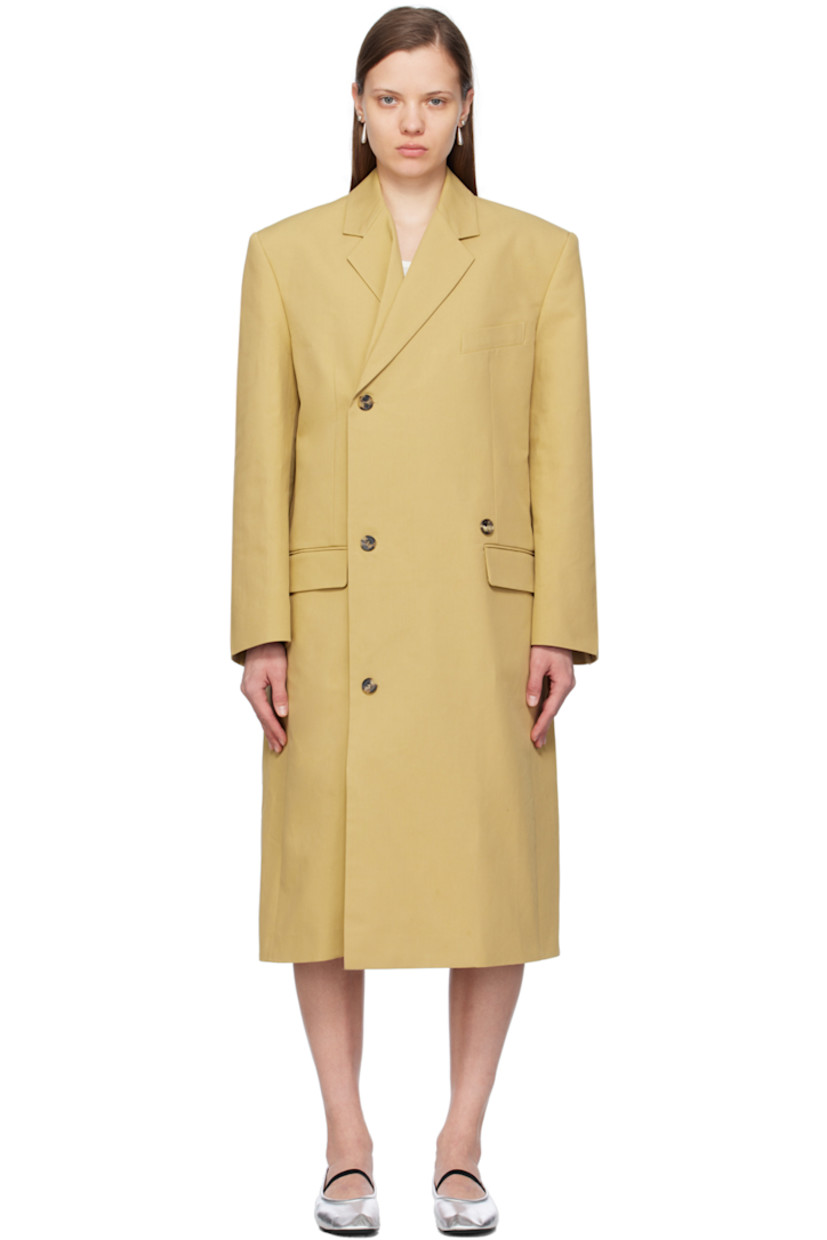 Plain-woven cotton coat.

· Notched lapel
· Folded double-breasted button closure
· Welt pocket and flap pockets
· Padded shoulders
· Vented cuffs
· Central vent at back hem
· Full Bemberg cupro-blend satin lining 

Supplier color: Khaki beige