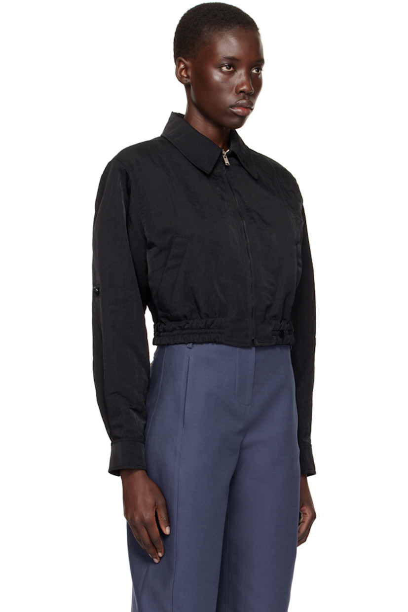 Crinkled nylon canvas jacket.

· Spread collar
· Zip closure
· Welt pockets
· Elasticized cropped hem
· Padded dropped shoulders
· Single-button barrel cuffs
· Full twill lining

Supplier color: Black