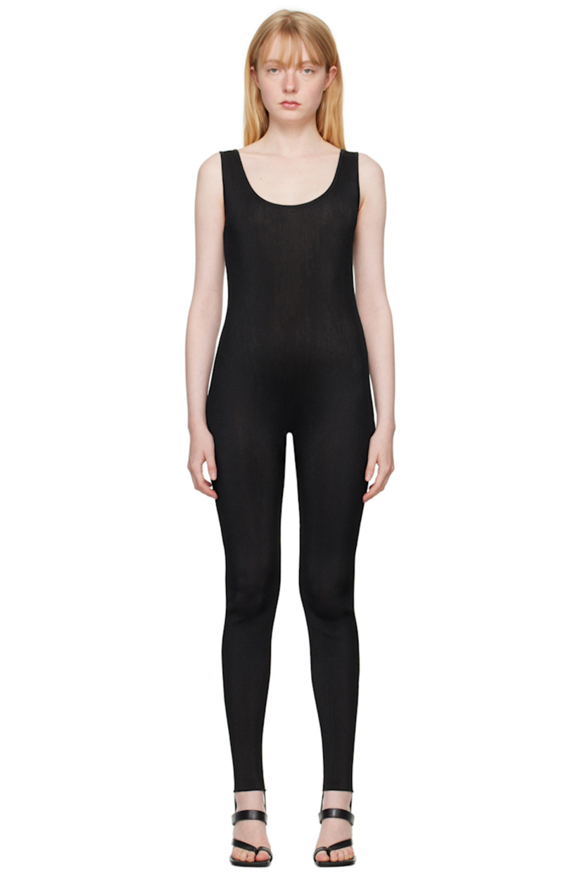 Semi-sheer rib knit nylon-blend bodysuit. Metallic thread detailing throughout.

· Scoop neck
· Stirrup at cuffs

Supplier color: Black