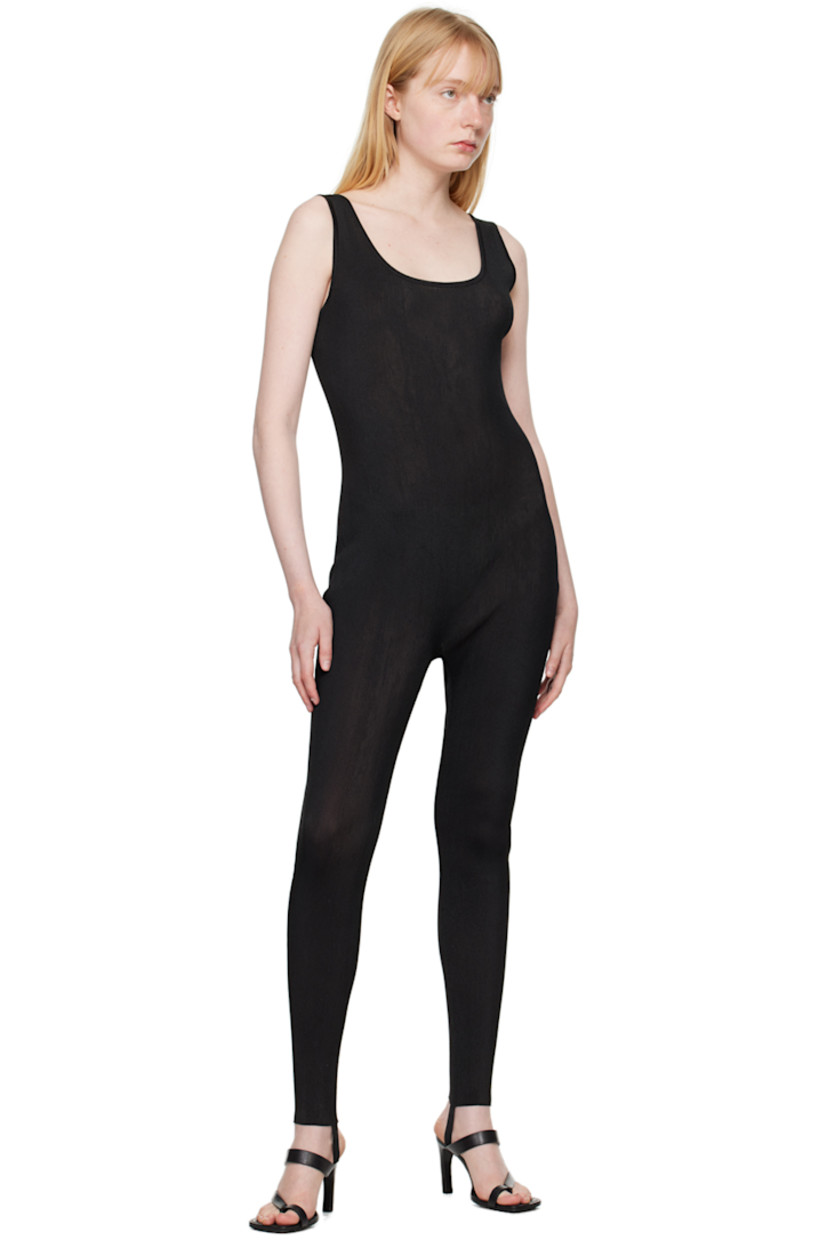 Semi-sheer rib knit nylon-blend bodysuit. Metallic thread detailing throughout.

· Scoop neck
· Stirrup at cuffs

Supplier color: Black