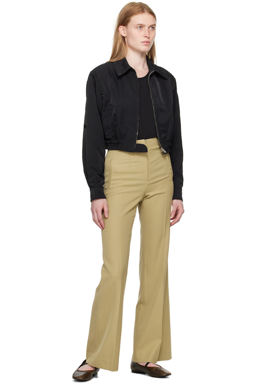 Flared viscose- and virgin wool-blend gabardine trousers. 

· Four-pocket styling
· Zip-fly
· Creased legs

Supplier color: Greyish khaki