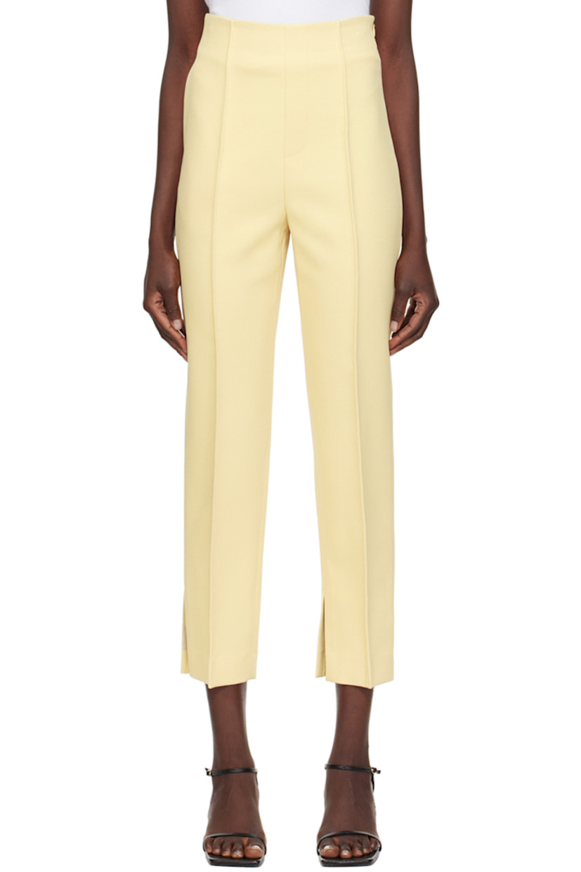 Slim-fit polyester twill trousers.

· High-rise
· Single-pocket styling
· Mock zip-fly
· Pinched seams at front and back
· Vented cuffs
· Concealed zip closure at outseam

Supplier color: Vintage yellow
