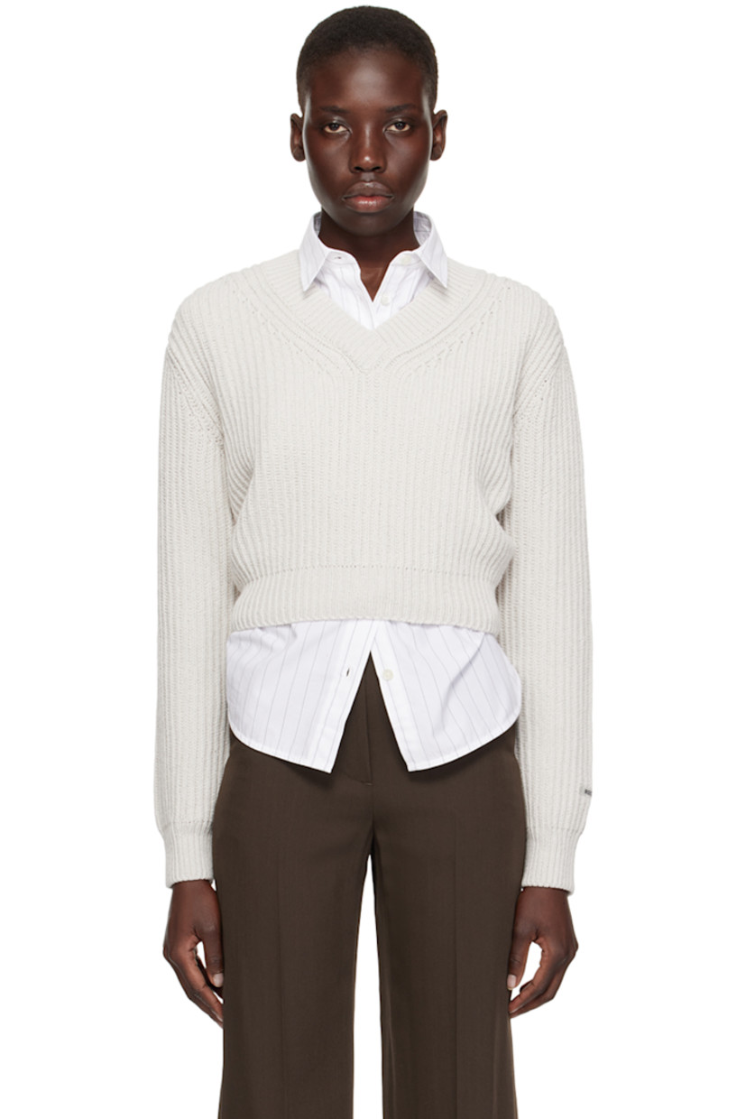 Rib knit cotton sweater.

· V-neck
· Dropped shoulders

Supplier color: White gray