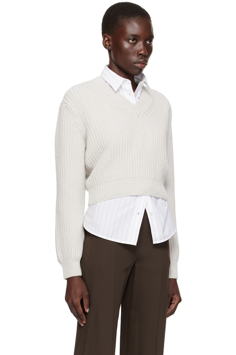 Rib knit cotton sweater.

· V-neck
· Dropped shoulders

Supplier color: White gray