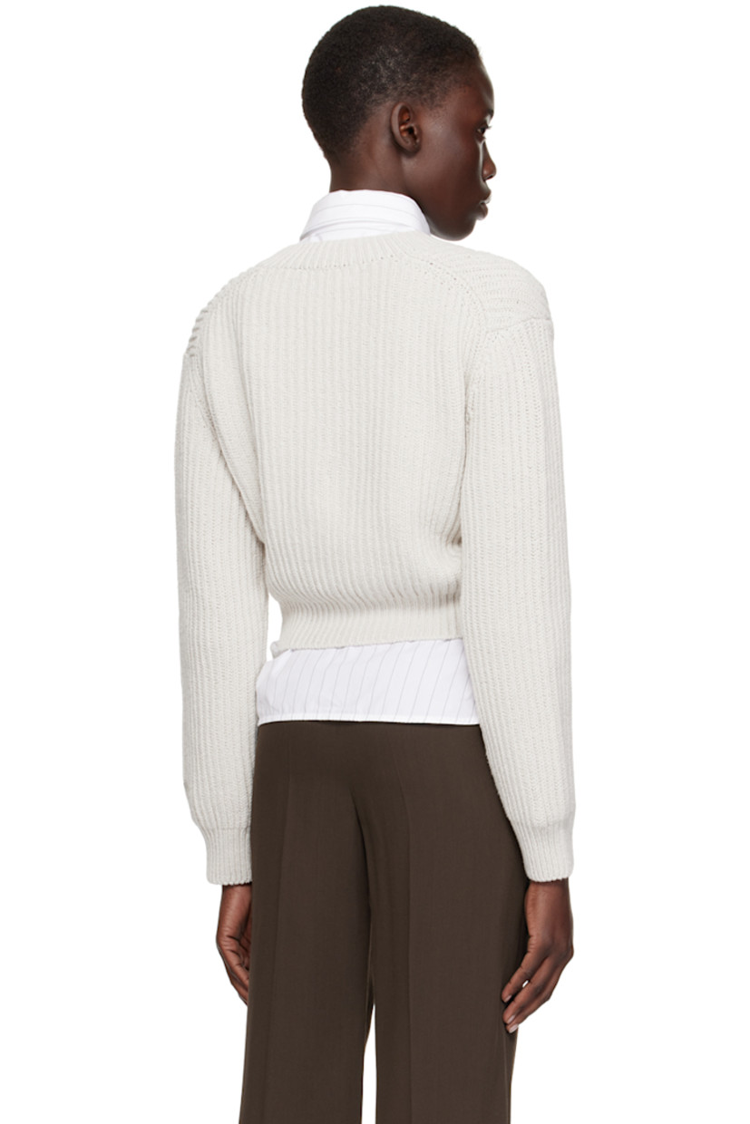 Rib knit cotton sweater.

· V-neck
· Dropped shoulders

Supplier color: White gray