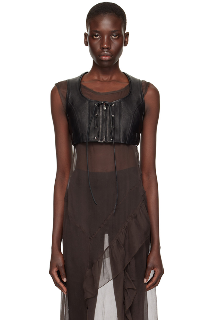 Grained goatskin vest.

· Scoop neck
· Zip closure
· Self-tie trim at front
· Eyelet at armscyes
· Adjustable button tabs at back hem
· Partial twill lining

Supplier color: Black