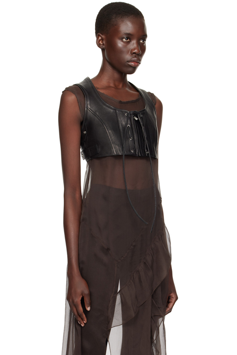 Grained goatskin vest.

· Scoop neck
· Zip closure
· Self-tie trim at front
· Eyelet at armscyes
· Adjustable button tabs at back hem
· Partial twill lining

Supplier color: Black