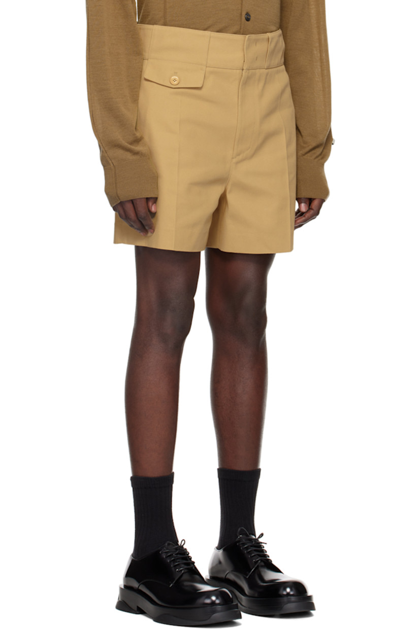 Polyester-blend drill shorts. 

· Belt loops
· Four-pocket styling
· Zip-fly
· Mock pocket at front waist
· Central crease at front legs
· Darts at back waist
· Pinched seam at back legs
· Unlined

Supplier color: Beige