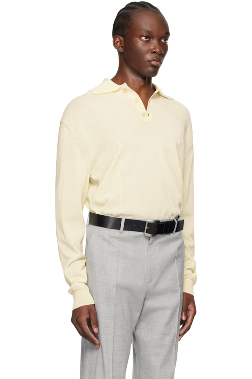 Semi-sheer knit cotton-blend polo. Garter stitch stripes throughout.

· Rib knit spread collar, hem, and cuffs
· Three-button placket
· Logo patch at cuff

Supplier color: Cream