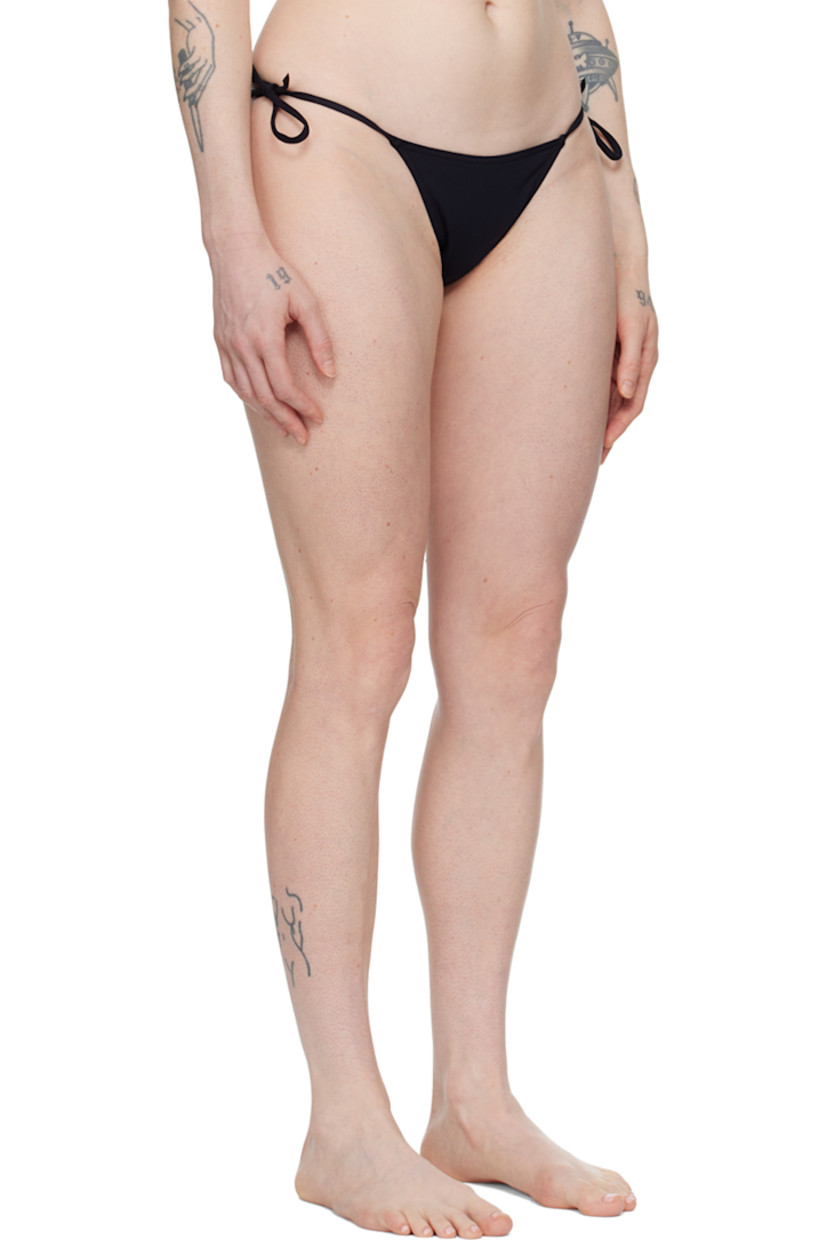 Stretch nylon jersey bikini bottom.

· Self-tie fastening at sides
· Partially lined

Supplier color: ultra