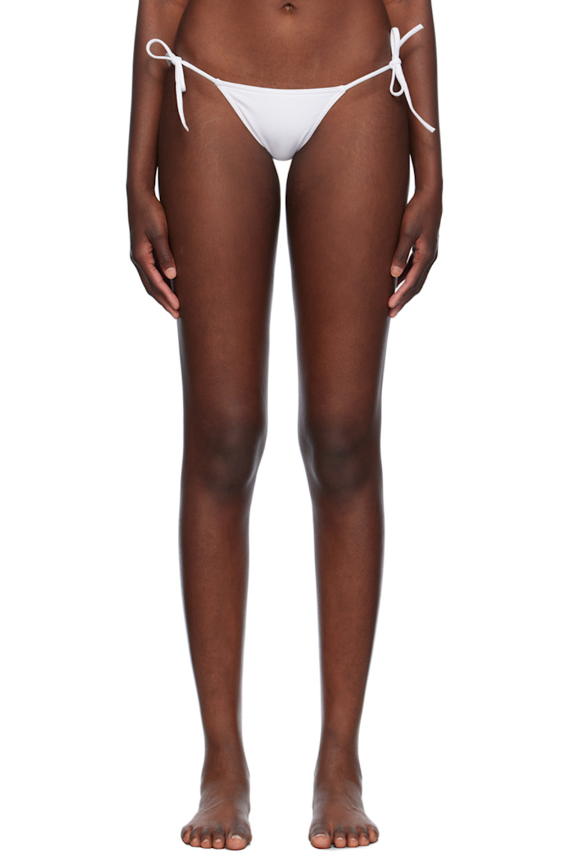 Stretch nylon jersey bikini bottom. 

· Self-tie fastening at sides
· Partially lined

Supplier color: Blanc