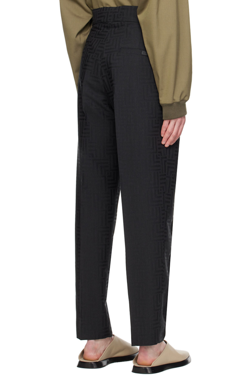 Straight-leg tapered plain-woven virgin wool-blend trousers. Jacquard graphic pattern throughout.

· Belt loops
· Four-pocket styling
· Zip-fly
· Pleats at front
· Creased legs
· Logo patch at back pocket

Supplier color: Black