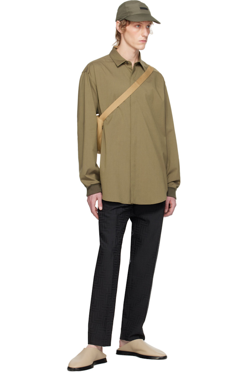 Straight-leg tapered plain-woven virgin wool-blend trousers. Jacquard graphic pattern throughout.

· Belt loops
· Four-pocket styling
· Zip-fly
· Pleats at front
· Creased legs
· Logo patch at back pocket

Supplier color: Black