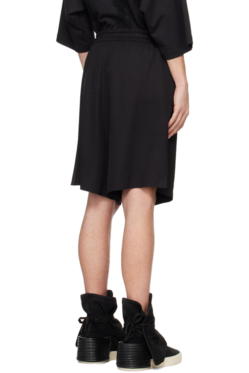 Silk- and virgin wool-blend twill shorts.

· Drawstring at elasticized waistband
· Two-pocket styling
· Leather logo patch at front
· Vented outseams

Supplier color: Black