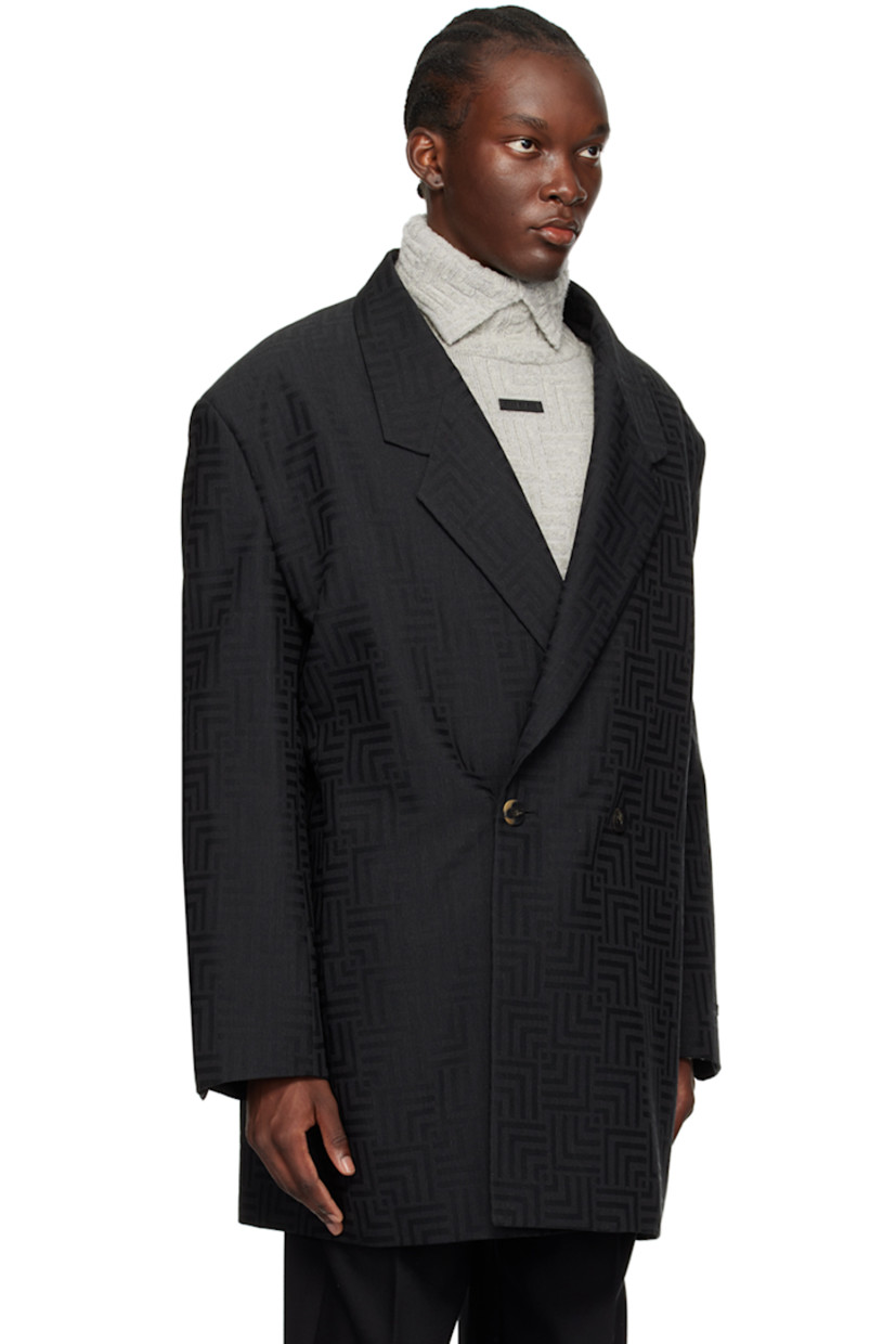 Virgin wool- and polyester-blend twill blazer. Jacquard graphic pattern throughout. 

· Notched lapel
· Double-breasted button closure
· Seam pockets
· Logo patch at cuff
· Buttoned vent at cuffs
· Locker loop at back collar
· Welt pockets at interior 
· Full satin lining
· Horn hardware

Supplier color: Black