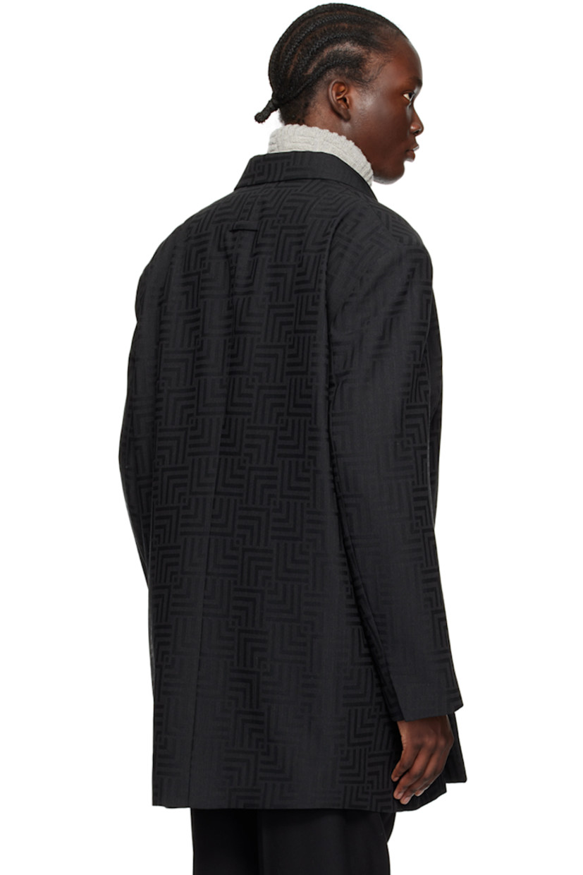 Virgin wool- and polyester-blend twill blazer. Jacquard graphic pattern throughout. 

· Notched lapel
· Double-breasted button closure
· Seam pockets
· Logo patch at cuff
· Buttoned vent at cuffs
· Locker loop at back collar
· Welt pockets at interior 
· Full satin lining
· Horn hardware

Supplier color: Black