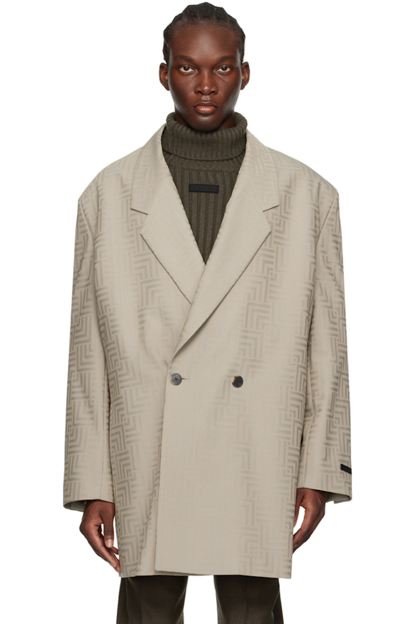 Virgin wool- and polyester-blend twill blazer. Jacquard graphic pattern throughout. 

· Notched lapel
· Double-breasted button closure
· Seam pockets
· Logo patch at cuff
· Buttoned vent at cuffs
· Locker loop at back collar
· Welt pockets at interior 
· Full satin lining
· Horn hardware

Supplier color: Dove grey