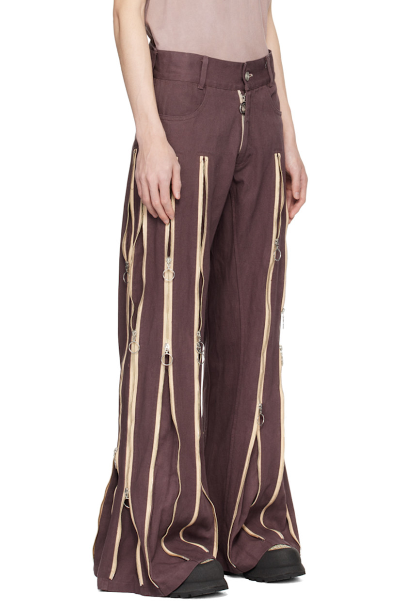 Garment-dyed non-stretch denim jeans. Fading and two-way zip expansion panels throughout. 

· Belt loops
· Two-pocket styling
· Logo hardware at zip-fly
· Quilted detailing at back

Supplier color: Brown garment dye