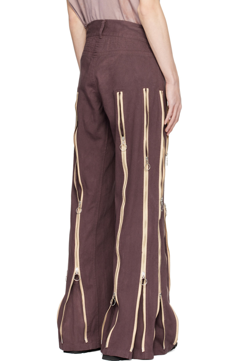 Garment-dyed non-stretch denim jeans. Fading and two-way zip expansion panels throughout. 

· Belt loops
· Two-pocket styling
· Logo hardware at zip-fly
· Quilted detailing at back

Supplier color: Brown garment dye