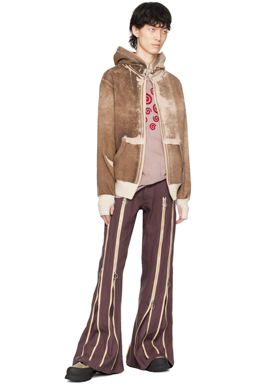 Garment-dyed non-stretch denim jeans. Fading and two-way zip expansion panels throughout. 

· Belt loops
· Two-pocket styling
· Logo hardware at zip-fly
· Quilted detailing at back

Supplier color: Brown garment dye