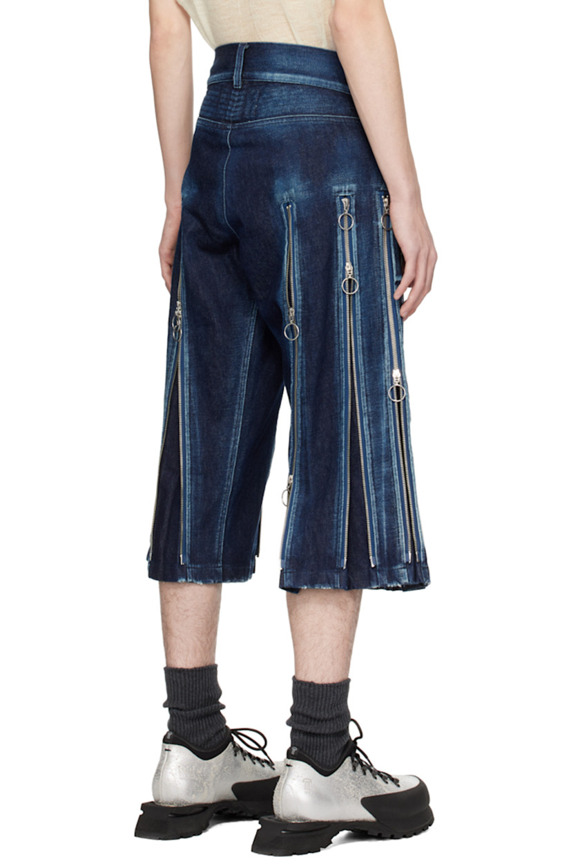 Non-stretch denim shorts. Fading and two-way zip expansion panels throughout.

· Belt loops
· Two-pocket styling
· Logo hardware at zip-fly

Supplier color: Washed indigo
