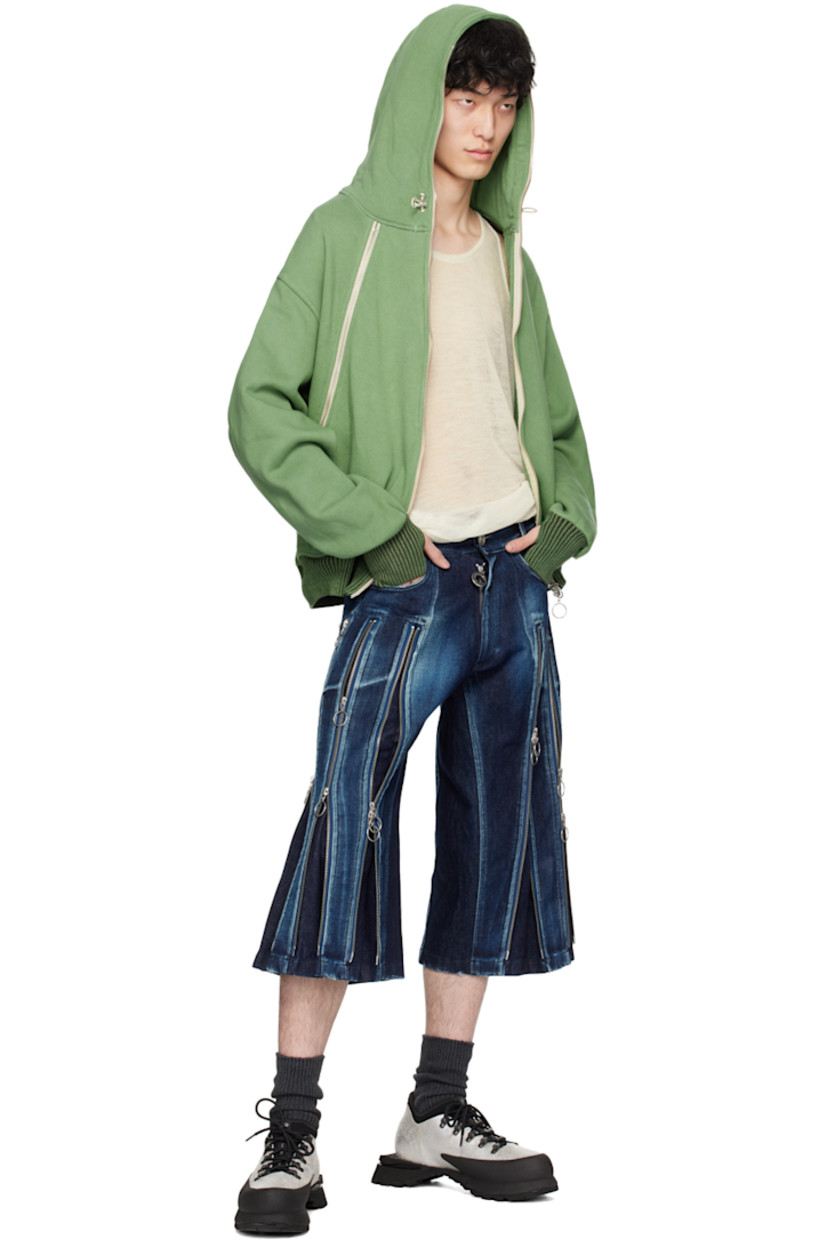 Non-stretch denim shorts. Fading and two-way zip expansion panels throughout.

· Belt loops
· Two-pocket styling
· Logo hardware at zip-fly

Supplier color: Washed indigo