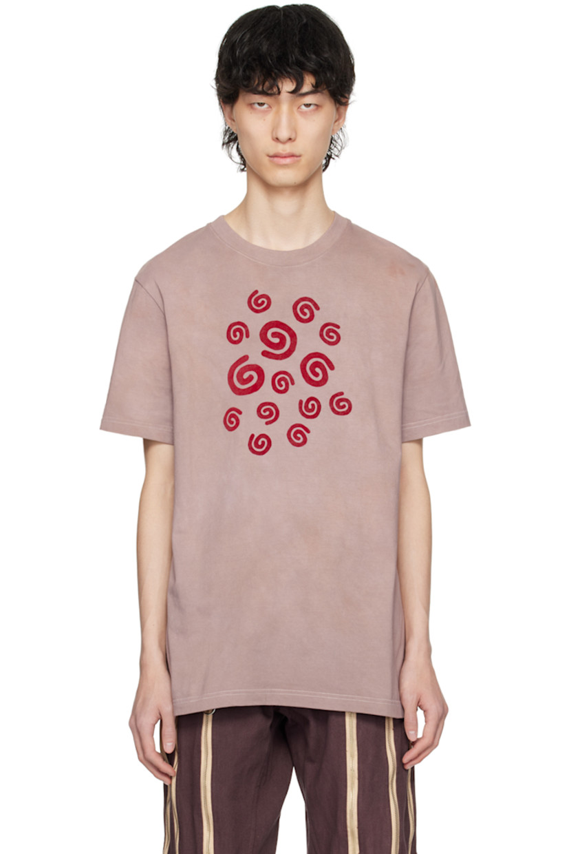 Garment-dyed cotton jersey T-shirt. Fading throughout. 

· Rib knit crewneck
· Graphics flocked at front 
· Contrast stitching in white 

Supplier color: Light brown garment dye