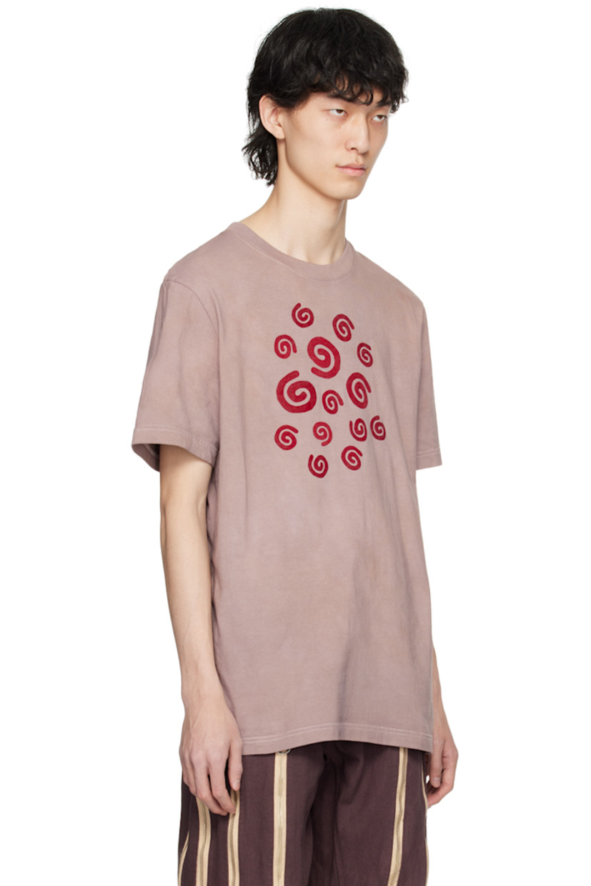 Garment-dyed cotton jersey T-shirt. Fading throughout. 

· Rib knit crewneck
· Graphics flocked at front 
· Contrast stitching in white 

Supplier color: Light brown garment dye