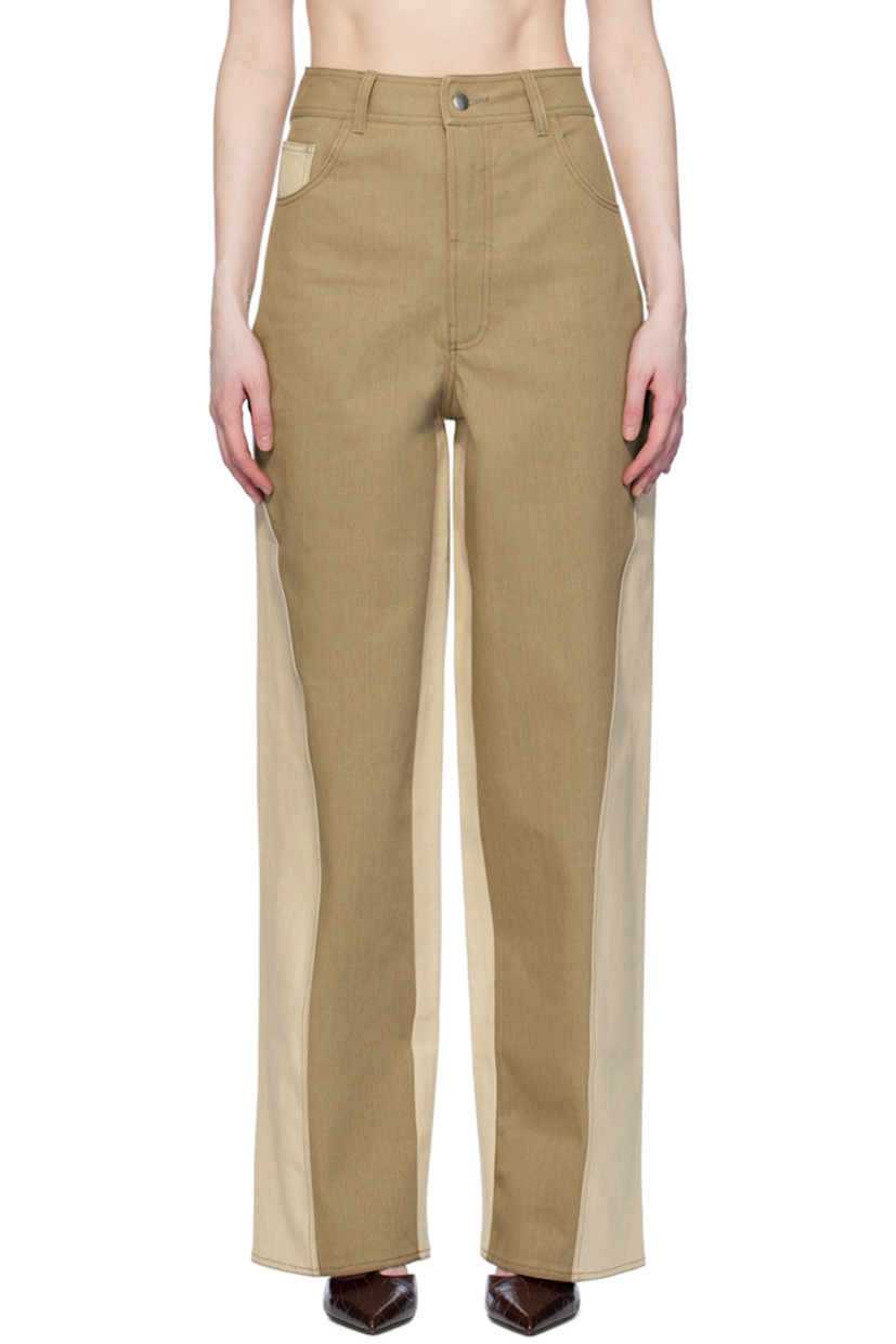 Straight-fit stretch denim jeans.

· Paneled construction
· Belt loops
· Five-pocket styling
· Zip-fly
· Twisted outseams

Supplier color: Khaki